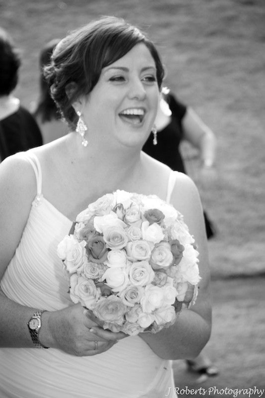 Bride laughing with guests - wedding photography sydney